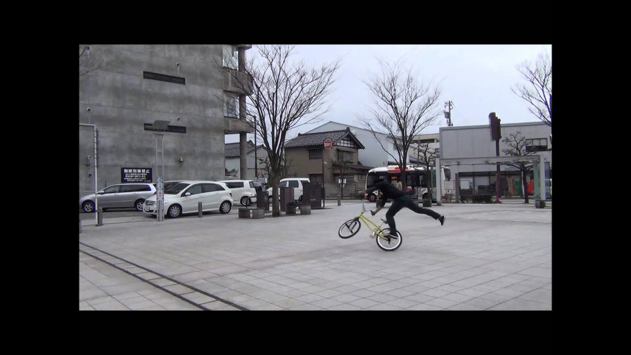 Guy doing cool bike tricks in Tatemachi, Kanazawa.