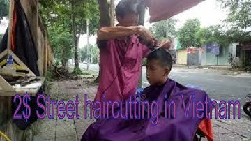 $2 Cắt tóc vỉa hè ở Việt Nam. Cắt tóc bình dân.Street haircutting in Vietnam
