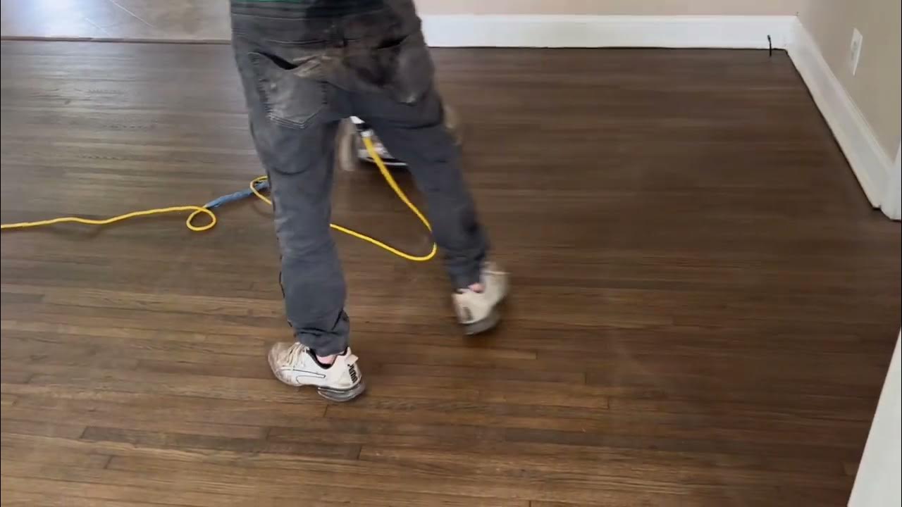 Hardwood floor water damage/ Sanding and Refinishing is the only option