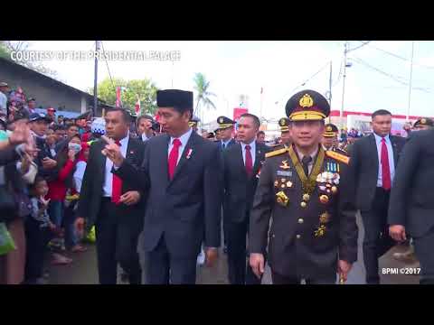 Indonesia's Jokowi decides to get out of car after being stuck in traffic