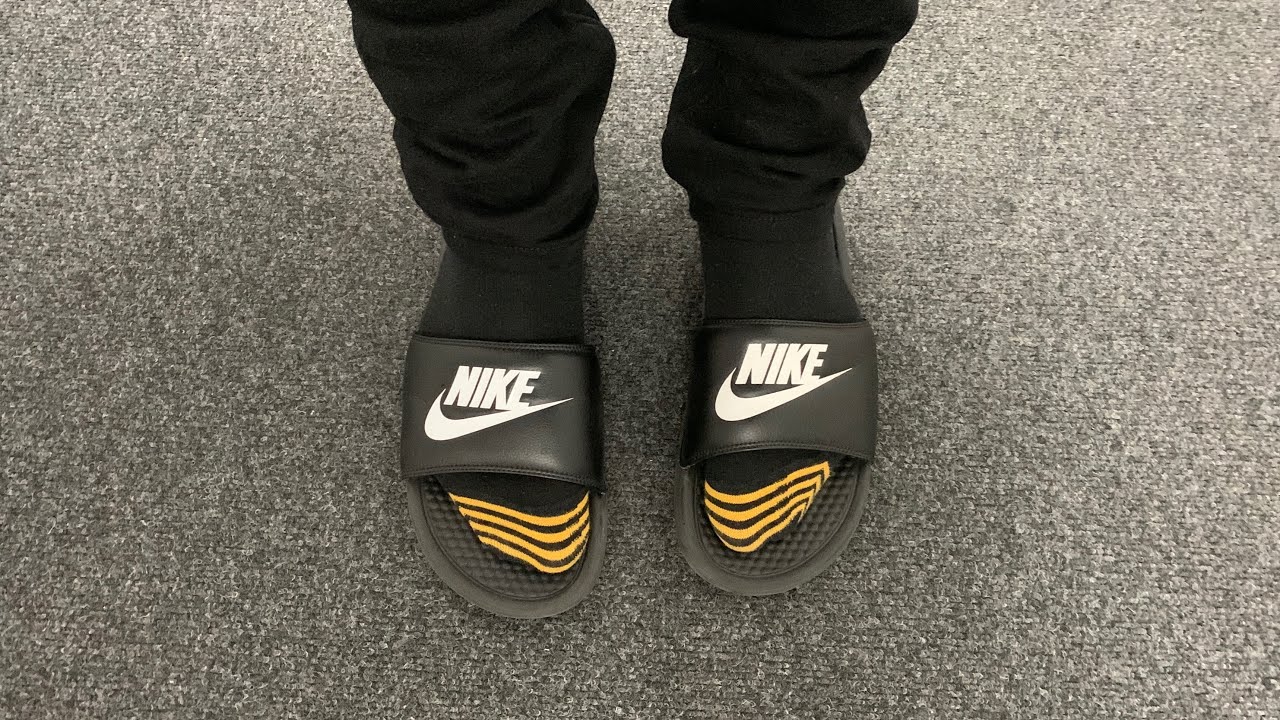 socks and nike slides