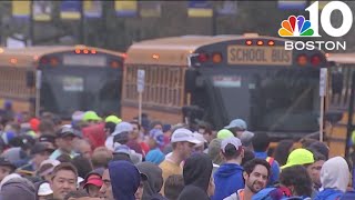 Eager runners prepare to head to the Boston Marathon starting line