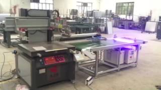 screen printer with LED UV curing system and automatic unloading arm