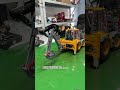 1/14 scale BL71 backhoe loader even features hydraulically openable and closable bucket!