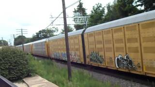 BNSF 4140, CSX 734 lead autorack train