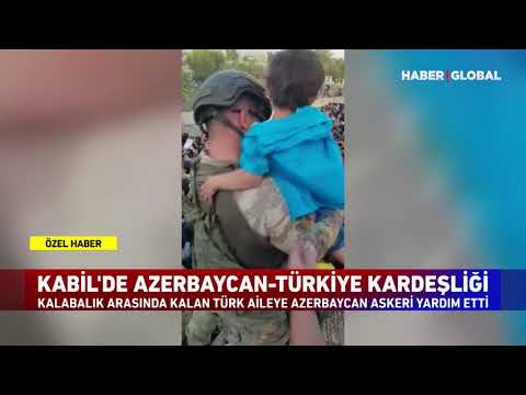 Kahraman Azerbaycan Askeri Kabil'de Kalabalıklar Arasında Kalan Türk Aileye Yardım Etti