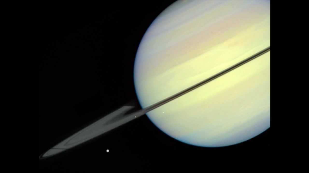 Saturn Moon Enceladus Shows Off Its Moves for Cassini (Video)