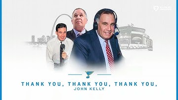 Former Blues announcer John Kelly receives a video tribute and standing ovation from fans.
