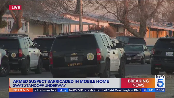 Suspect barricaded in Lancaster mobile home
