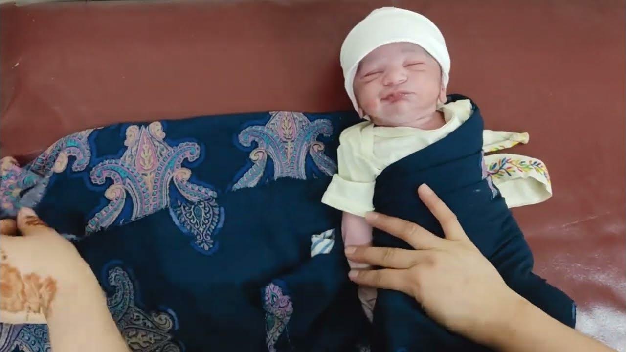 Swaddling of Clingy newborn baby with a different technique to make