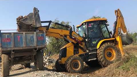 JCB Backhoe Loader Loading Stone in Tractor