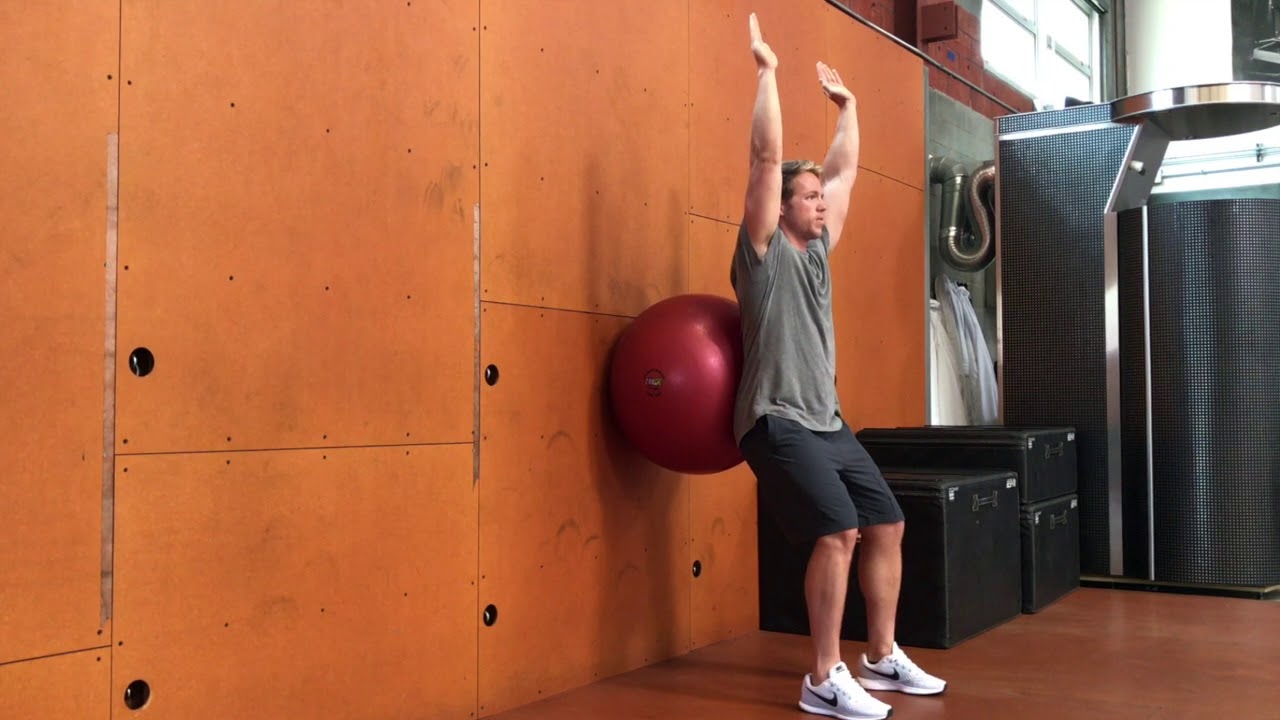 Stability Ball Wall Overhead Squat - YouTube
