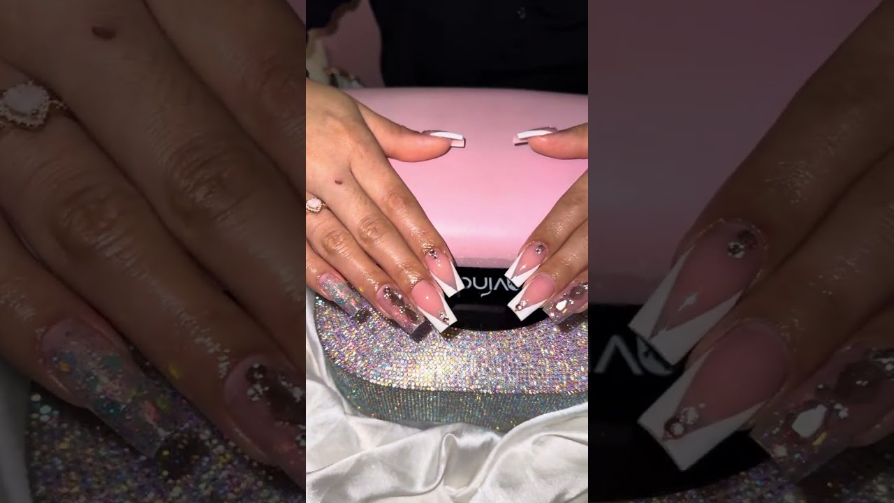 Elegant nail art:  subtle design with stunning accents