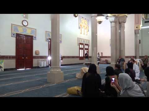 Muslim man praying in Jumeirah Mosque