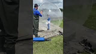 Zorbing {New} Getting in a zorbing ball