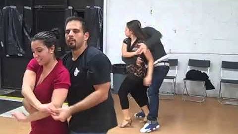 Caridad Portella rehearsing salsa dance routine at Cache Studios