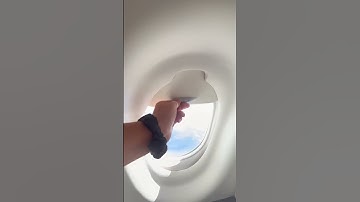 Airplane bathroom has a window? Coolest thing EVER!