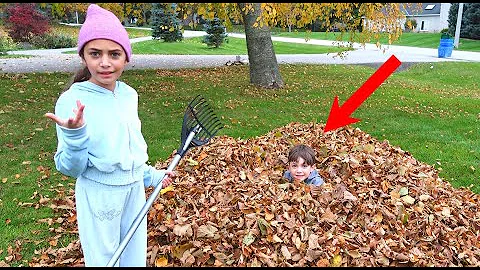 Heidi and Zidane Playing and cleaning up the leafs