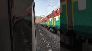 intercity express crosses CR's Queen . Deccan Queen Express.