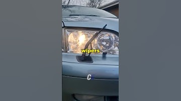 Why do old cars have headlight wipers?