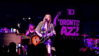 Toronto jazz festival, nathan philip's square, june 27, 2016. grace
potter vocals, keyboards & guitar, ben alleman rhythm guitar and
keyboards, eliza hardy j...