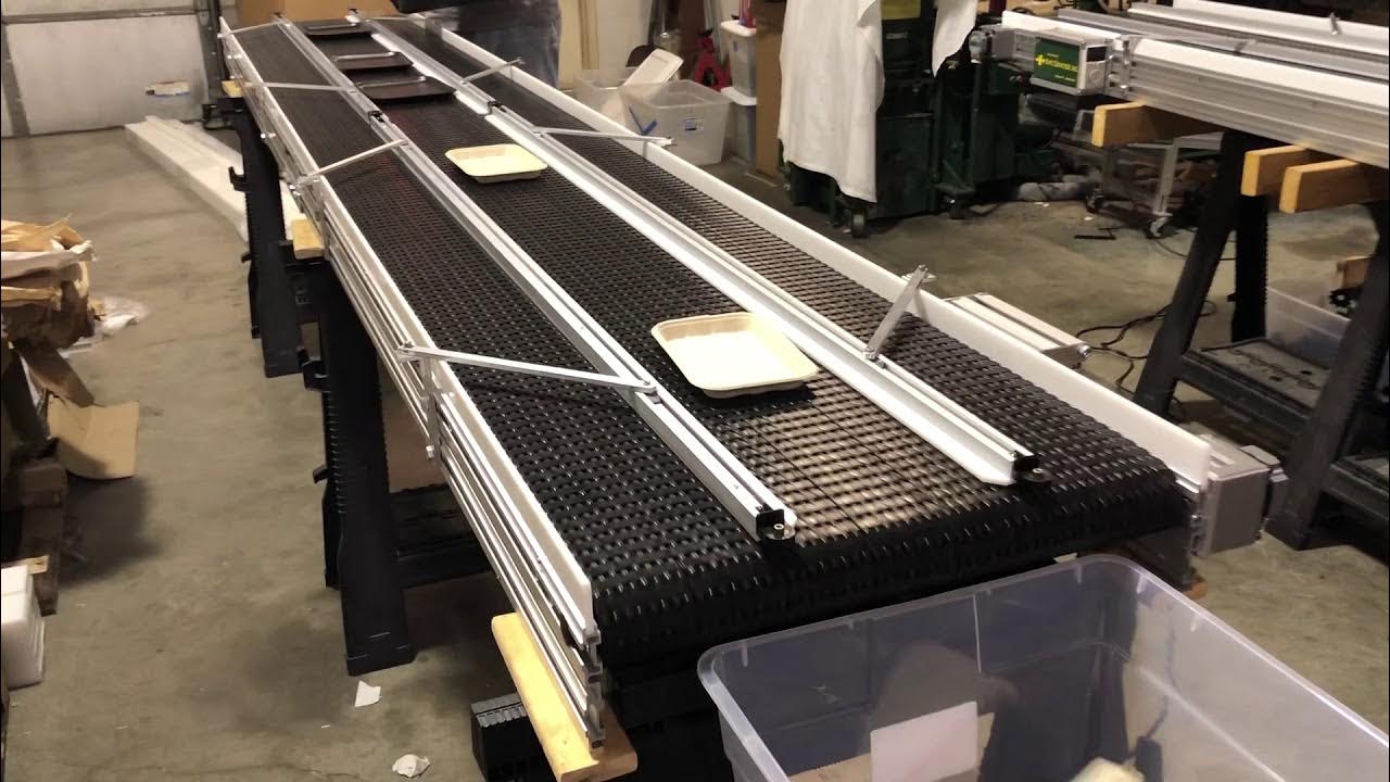 Moving Trays with Safe Conveyor, Inc. using adjustable custom guide