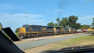 Two CSX trains working together 