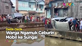 Gegara Ugal-Ugalan, Warga Hancurkan Mobil Dan Ceburin Ke Sungai