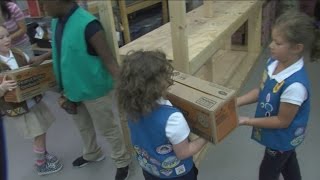 Girl scouts deliver Cookies for Troops deployed overseas