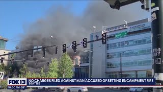 Man accused of causing massive encampment fire released with no charges filed | FOX 13 Seattle