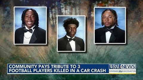 Community pays tribute to three high school football players killed in car crash