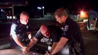 Cops Tv show Spokane Washington. Traffic stop/uncooperative driver. (2003).