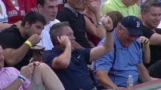 Fan makes a slick grab on a foul ball