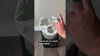 How to put on a trash bag properly.