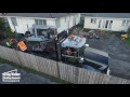 Timelapse house lifted onto truck