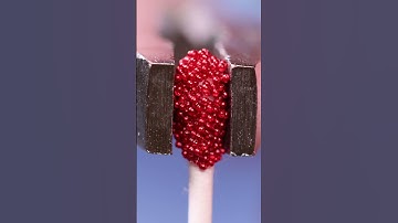 Glitter beans vs. Pliers (close up / macro) #slowmotion #closeup #macro #satisfying #asmr #slowmo