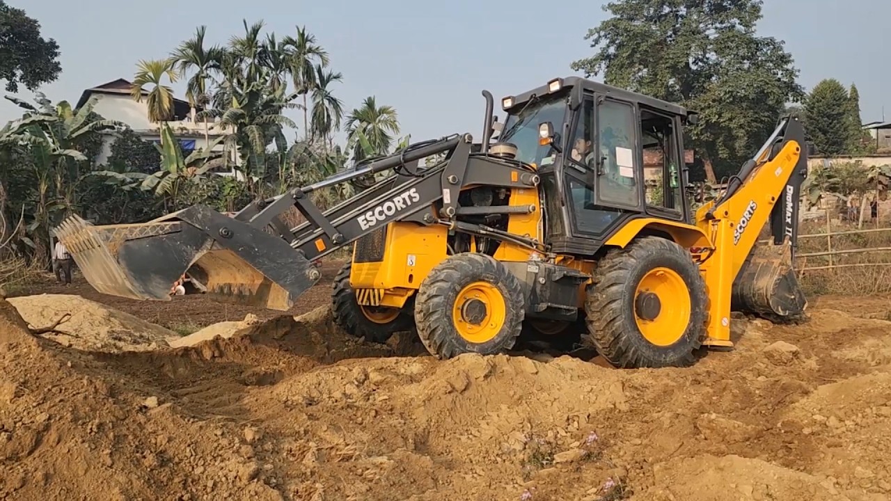 New Escorts Backhoe Loader Leveling ground - New Dozer Making Football Ground - Dozer Video 16