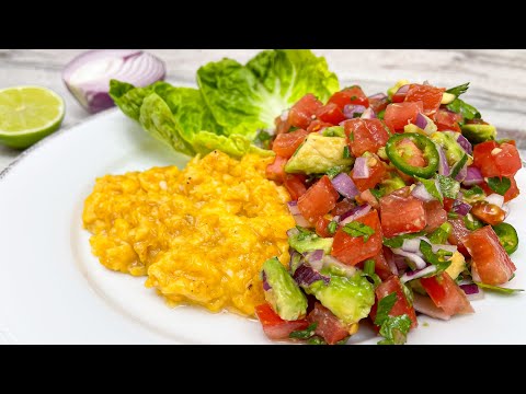 Mexican style scrambled eggs with vegetables. Tasty breakfast recipe.