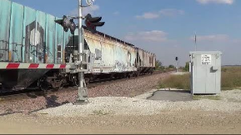 Union Pacific covered hopper train with a wide variety of hoppers including blue Rock Island!