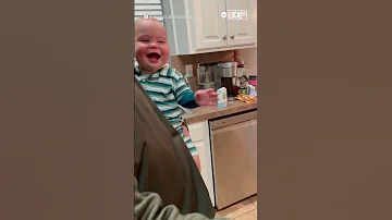 Giggling Baby Throws Head Back In Laughter 