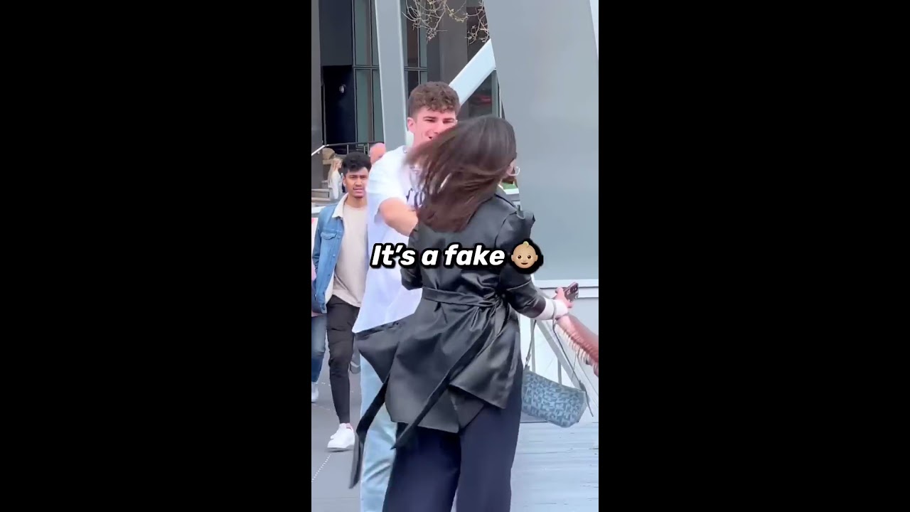 KICKING A BABY PRANK Shorts