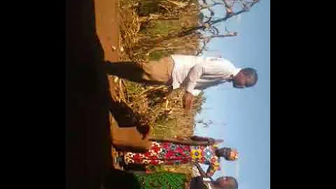 DAFA and  Chifuniro Kandaya with Tikondane farmers club processing briquettes from Agri-waste.