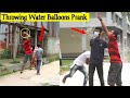 Throwing ice water balloons at people  prank  by  comical tv