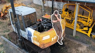 Rebuilding the center joint and more pressure washing - Excavator project