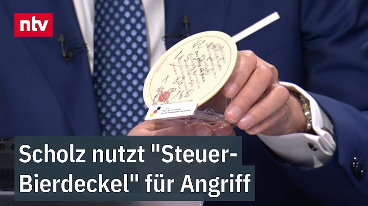 Schlagabtausch mit Merz: Scholz nutzt "Steuer-Bierdeckel" für Angriff