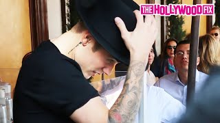 Justin Bieber Gets Nervous \& Hides Under His Hat While Leaving Lunch At Il Pastaio In Beverly Hills
