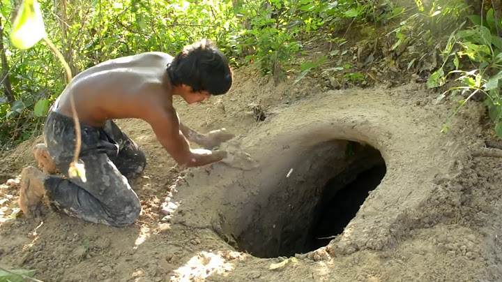 Construir casa subterrânea escondida na floresta