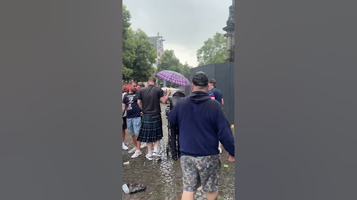 The most wholesome moment of #EURO2024 as Scotland fans protect an elderly local from the rain 🥹