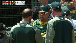 Laa Maxwell Takes Foul Tip Off Of His Face Mask