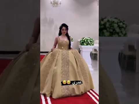 فستان خطوبه ملكيه فخمه باللون الذهبي